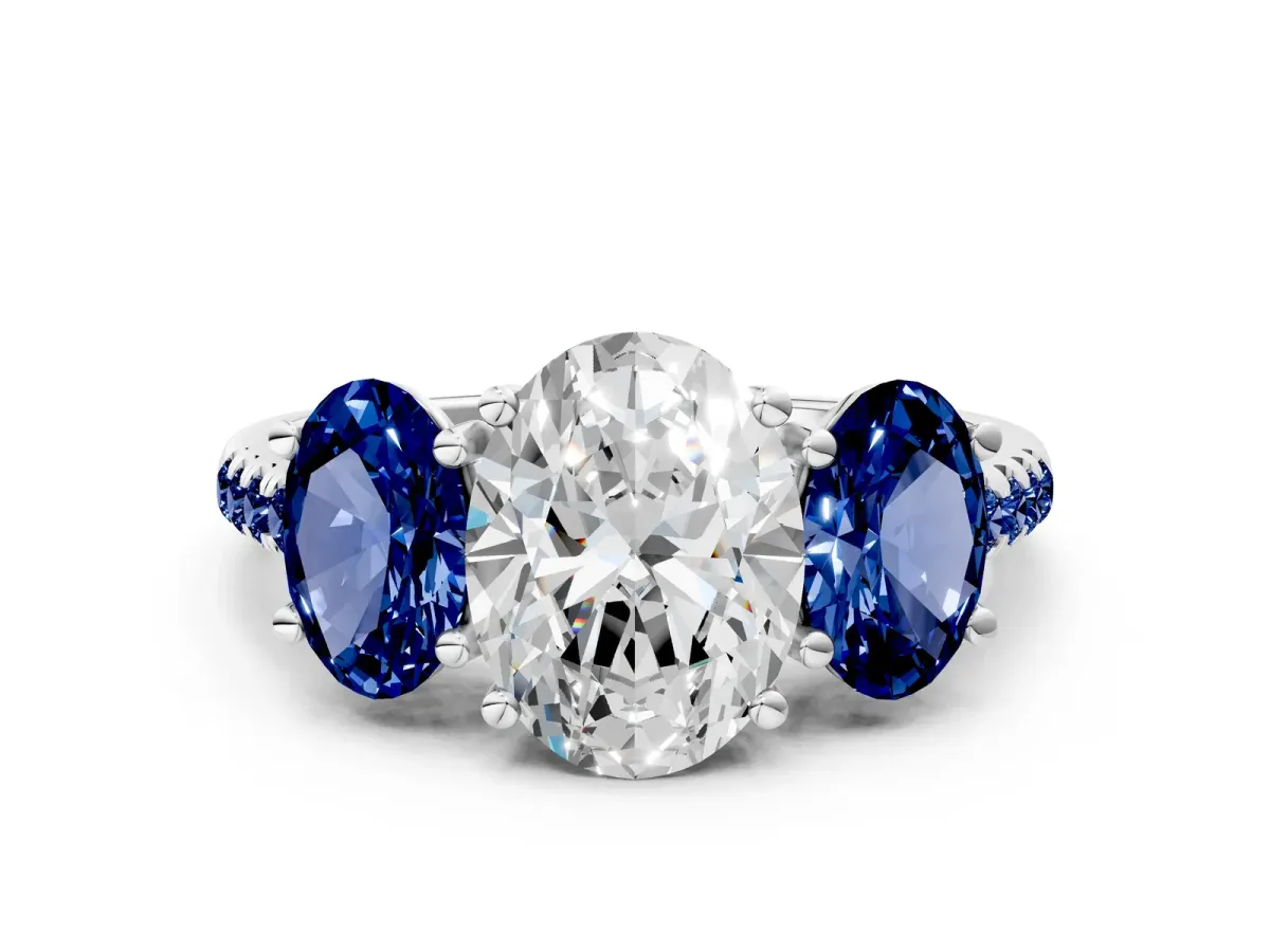 Three-Stone Oval Cut Diamond Ring with Round Blue Sapphire Pavé Band and Prong Setting Silver