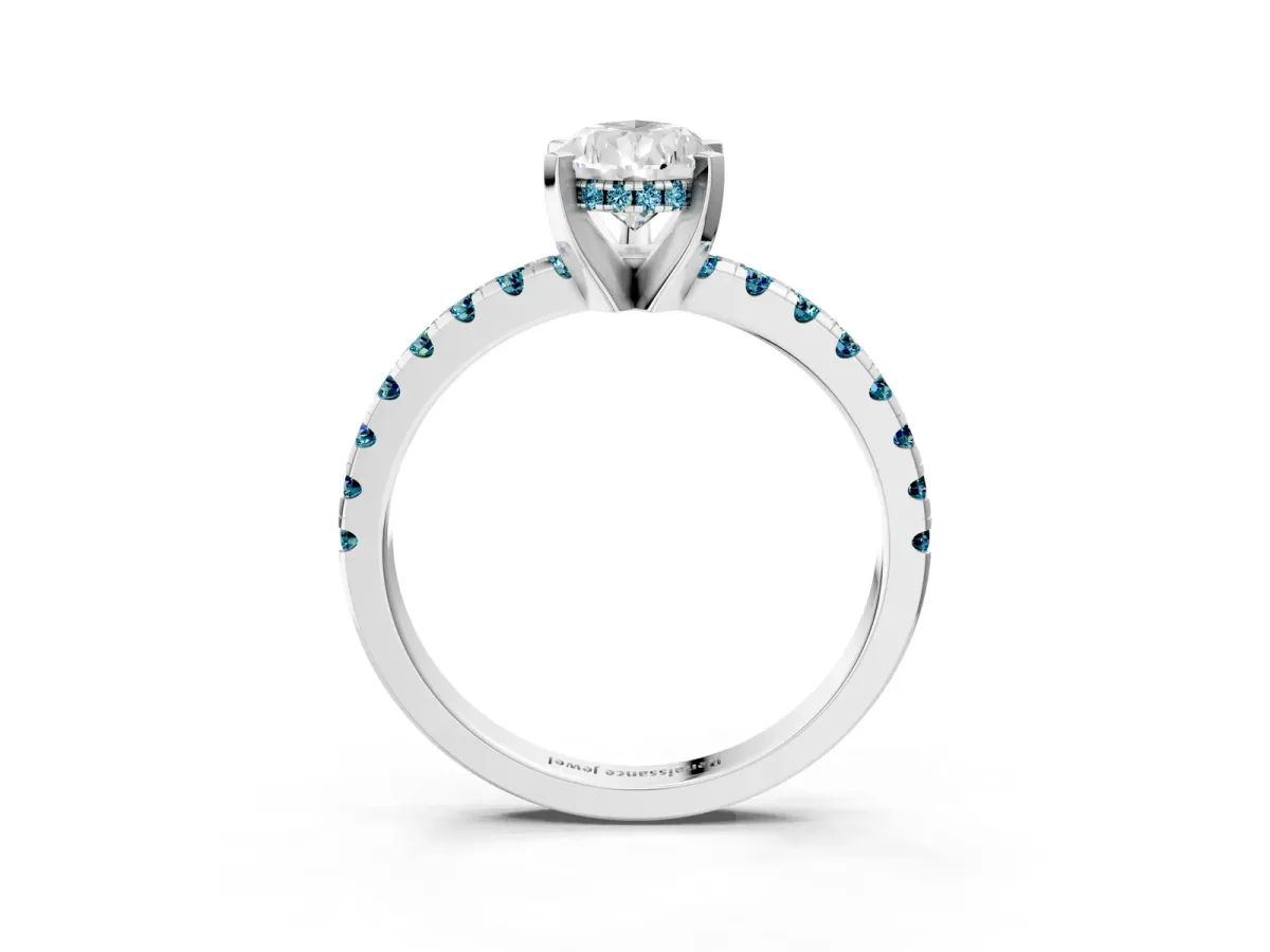 Pear Cut Diamond Solitaire Ring with Round Blue Topaz Pavé Band and Four-Prong Setting Silver