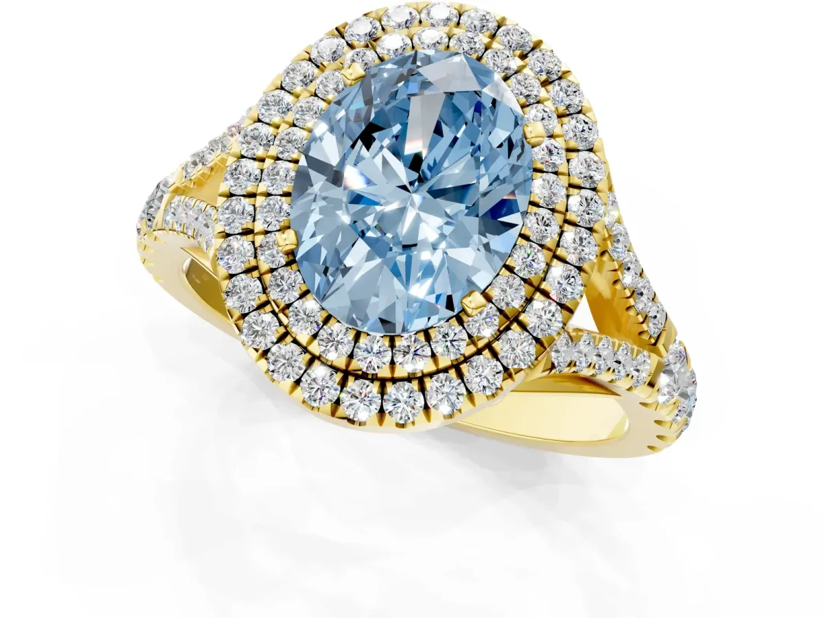 Fancy Blue Double Halo Oval Cut Diamond Split Shank Engagement Ring with Four-Prong Setting Yellow gold