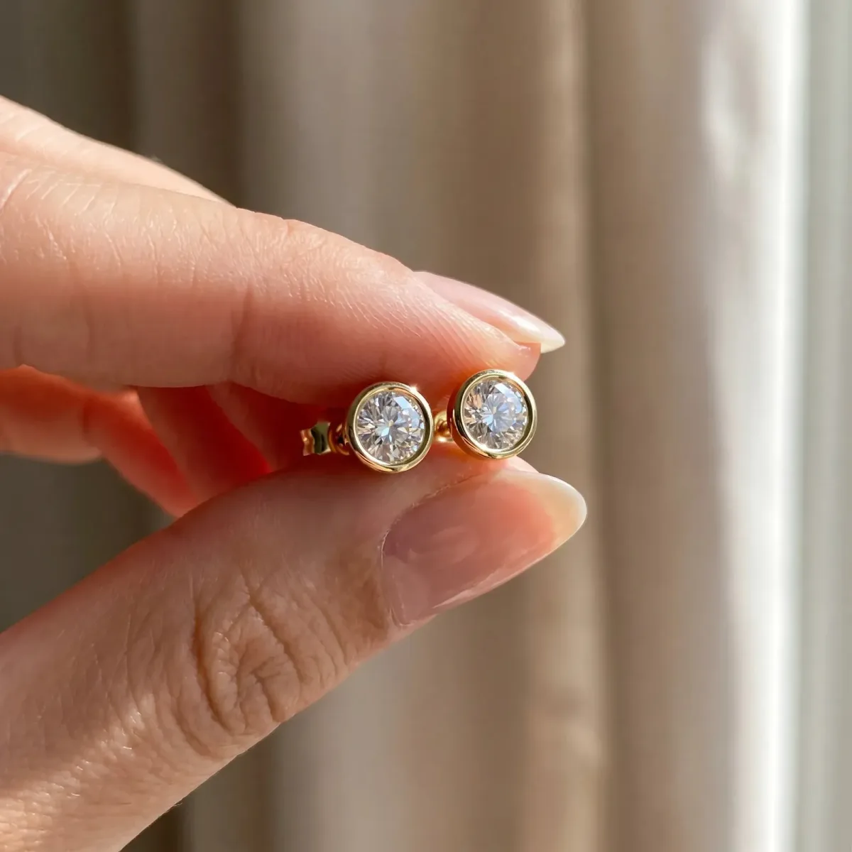 Bezel Set Round Diamond Stud Earrings with Push Back Yellow gold
