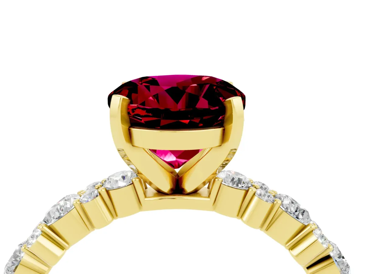 Round Cut Garnet Side Stone Solitaire Ring with Round and Four-Prong Setting Yellow gold