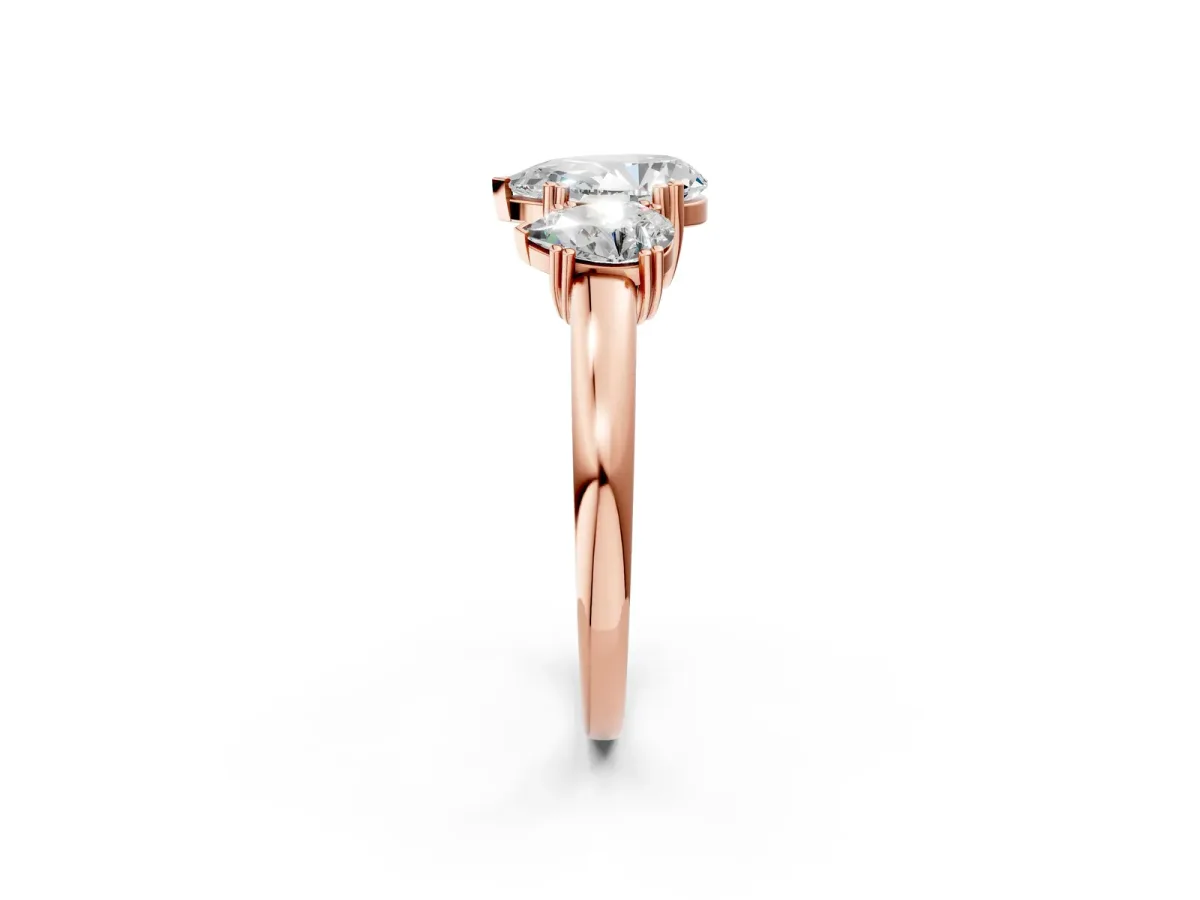 Three-Stone Pear Cut Cut Diamond Ring with Channel Set Band and Four-Prong Setting Rose gold