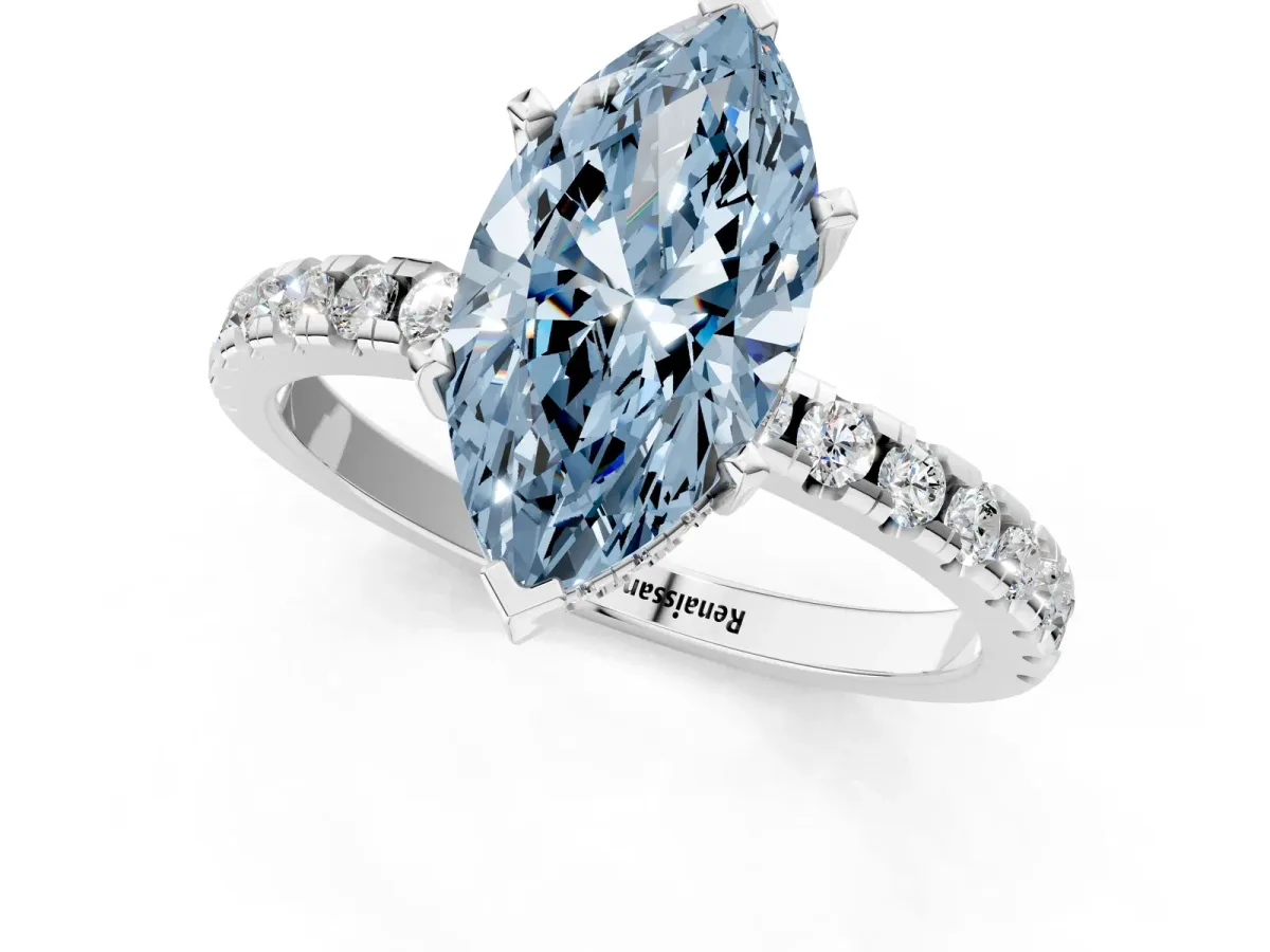 Fancy Blue Marquise Cut Diamond Solitaire Ring with Round Pavé Band and Four-Prong Setting Silver