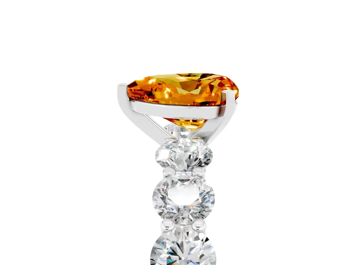 Heart Cut Citrine Prong Setting with Side Stones on a Pave Band Platinum