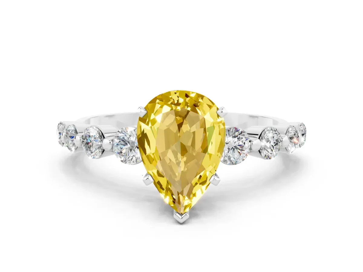 Pear Cut Solitaire Yellow Sapphire Ring with Pave Band and Four-Prong Setting Silver