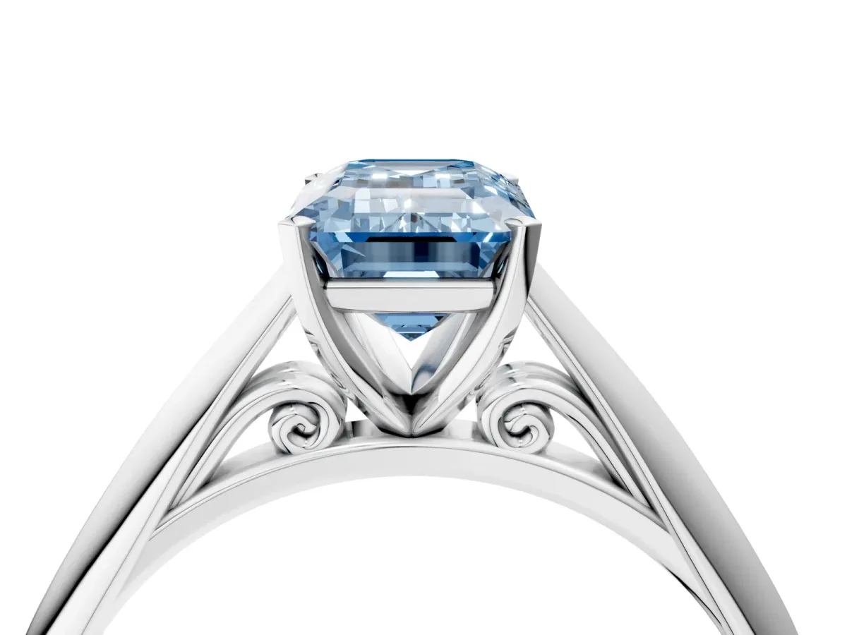 Fancy Blue Emerald Cut Diamond Solitaire Engagement Ring with Cathedral Setting and Four-Prong Mount White gold