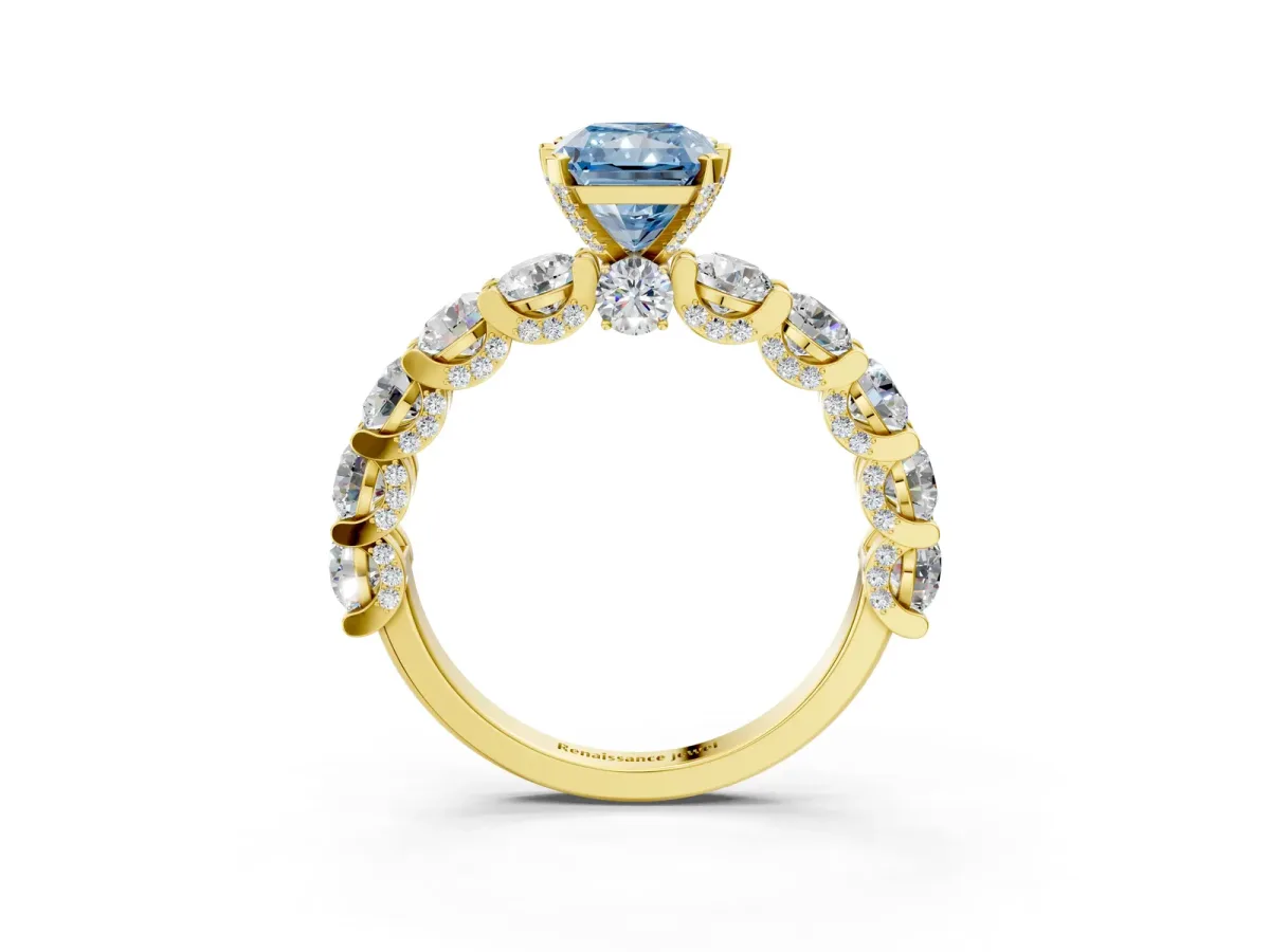 Fancy Blue Radiant Cut Diamond Side Stone Engagement Ring with Four-Prong Setting Yellow gold