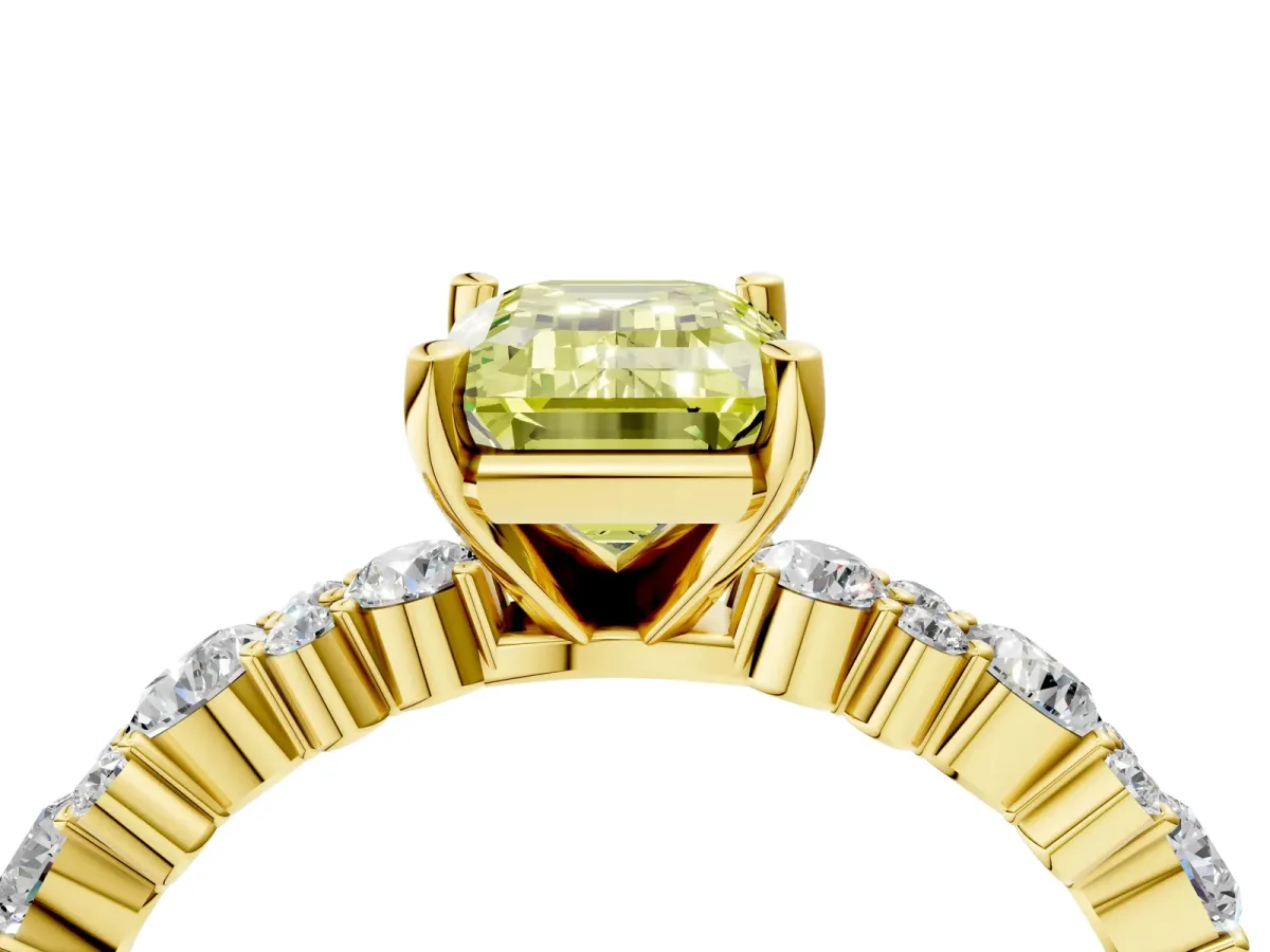 Fancy Yellow Emerald Cut Diamond Side Stone Solitaire Ring with Round and Four-Prong Setting Yellow gold