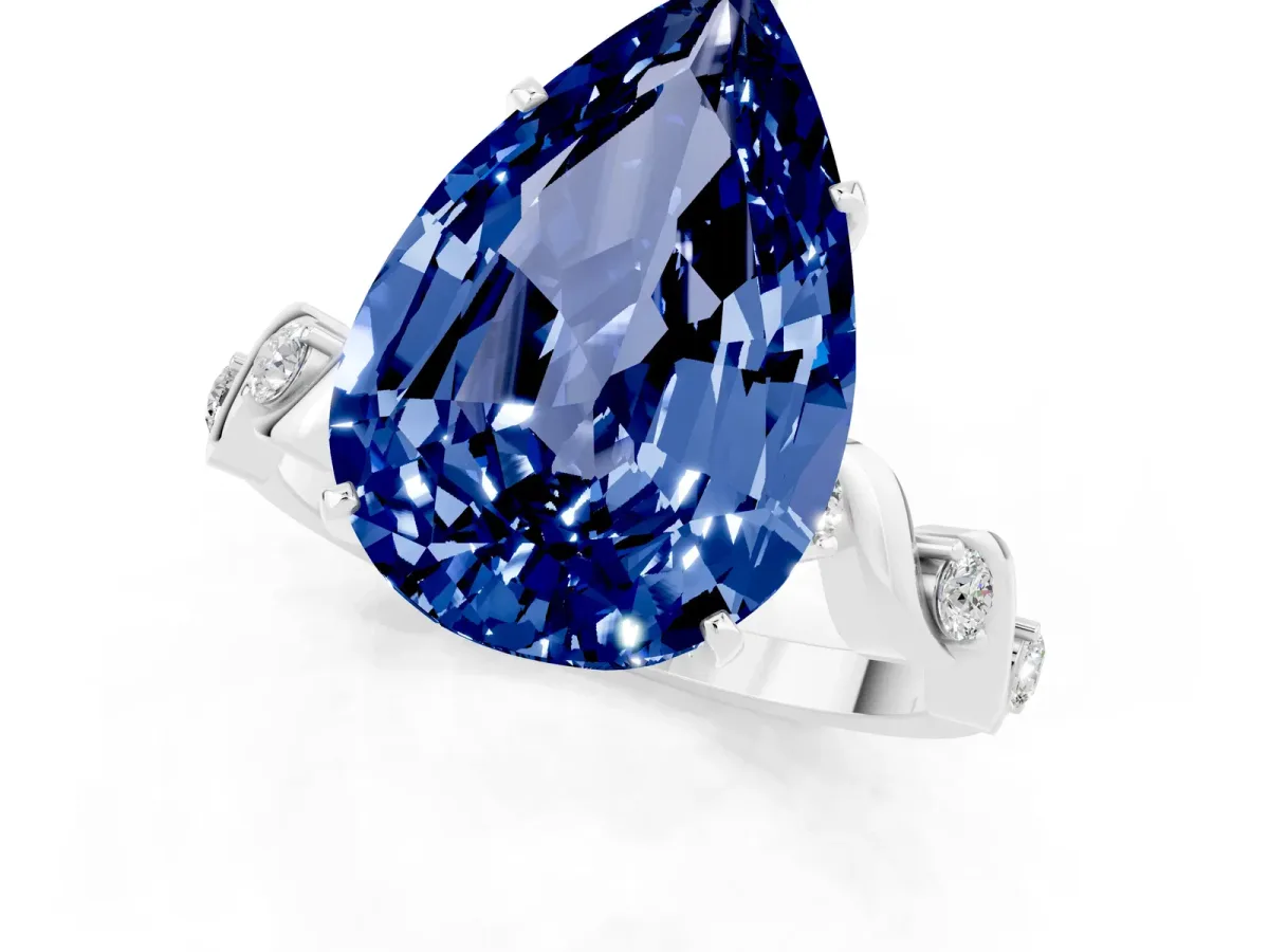Pear Cut Blue Sapphire Solitaire Twisted Band with Round Accents and Prong Setting Silver