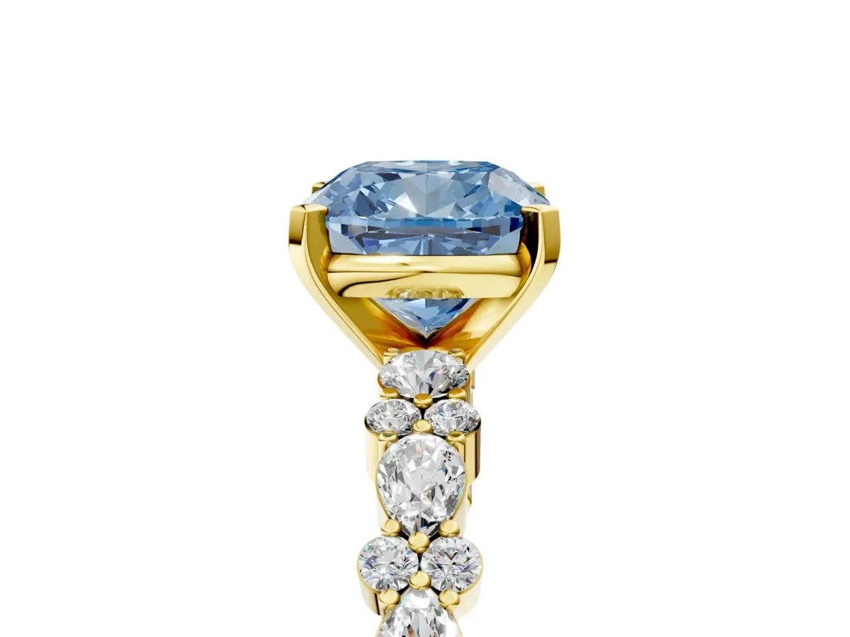 Fancy Blue Cushion Cut Diamond Side Stone Solitaire Ring with Round and Four-Prong Setting Yellow gold