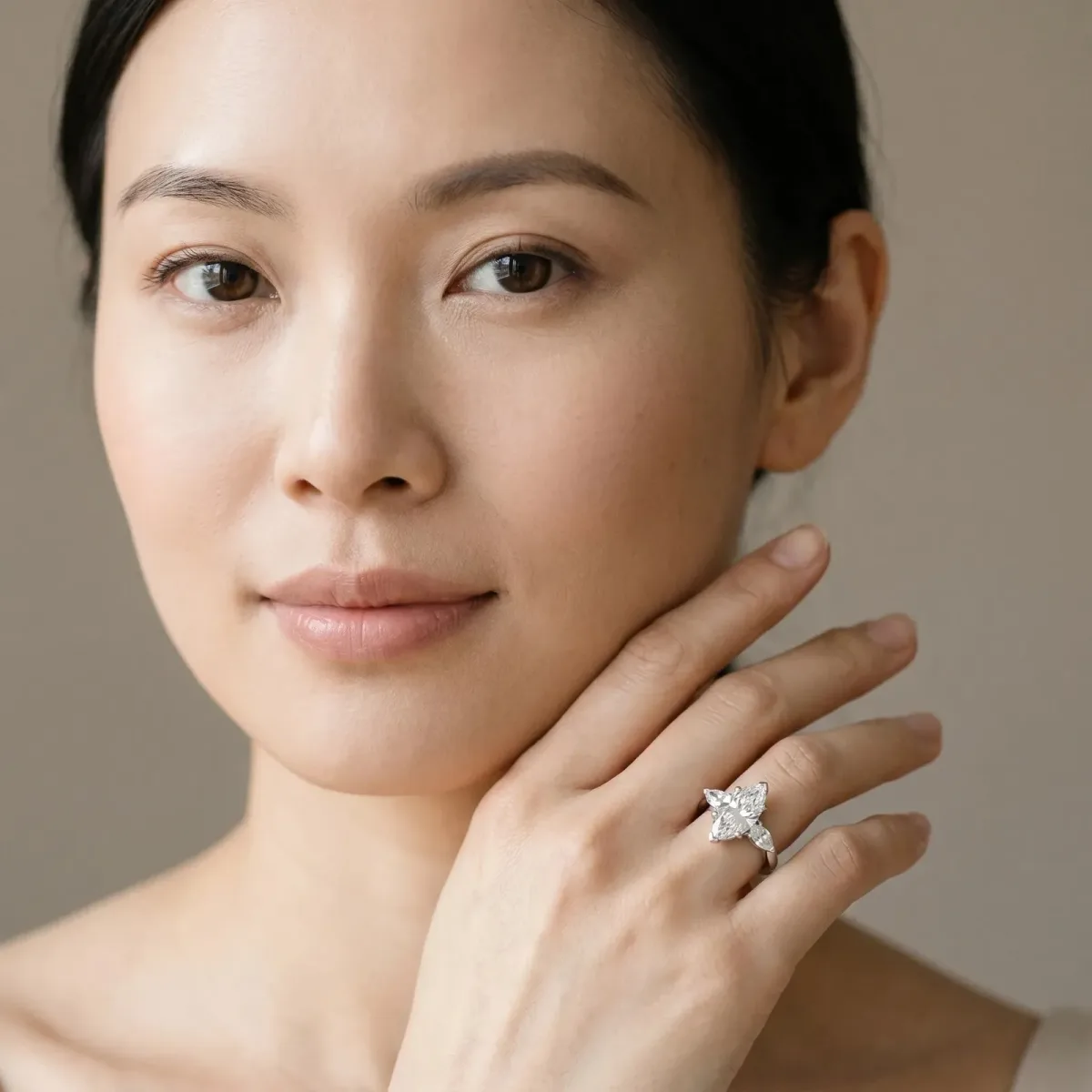 Three-Stone Marquise Cut Cut Diamond Ring with Channel Set Band and Four-Prong Setting Platinum