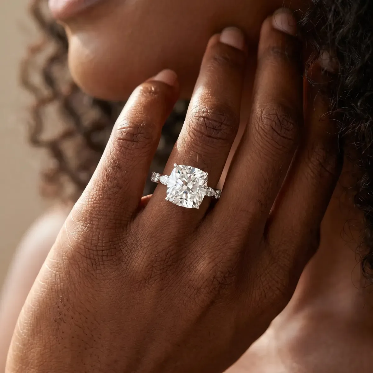 Cushion Cut Diamond Ring with Marquise and Round Side Stones and Four-Prong Setting Silver