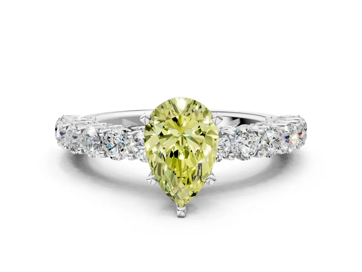 Fancy Yellow Pear Cut Diamond Solitaire Ring with Shared Prong Pavé Band and Four-Prong Setting Silver