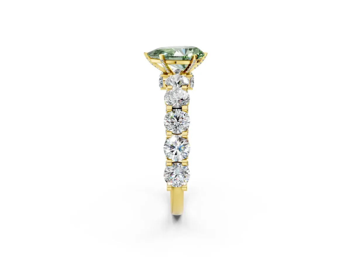 Fancy Green Pear Cut Diamond Side Stone Engagement Ring with Four-Prong Setting Yellow gold