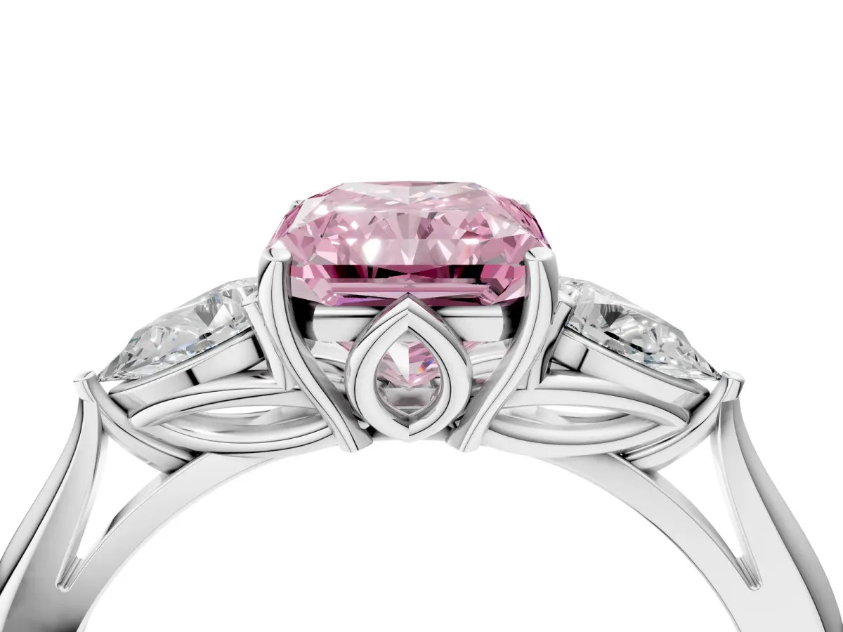 Fancy Pink Three-Stone Radiant Cut Diamond Ring with Pear Side Stones in Four-Prong Setting Platinum