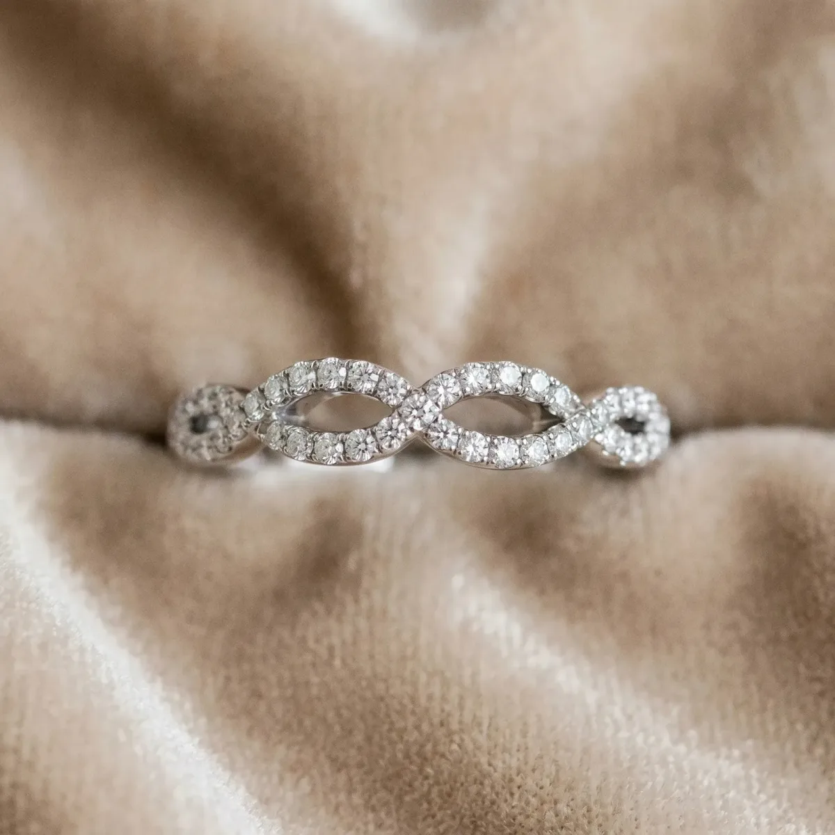 Infinity Twist Diamond Pavé Band with Round Stones and Prong Setting Silver