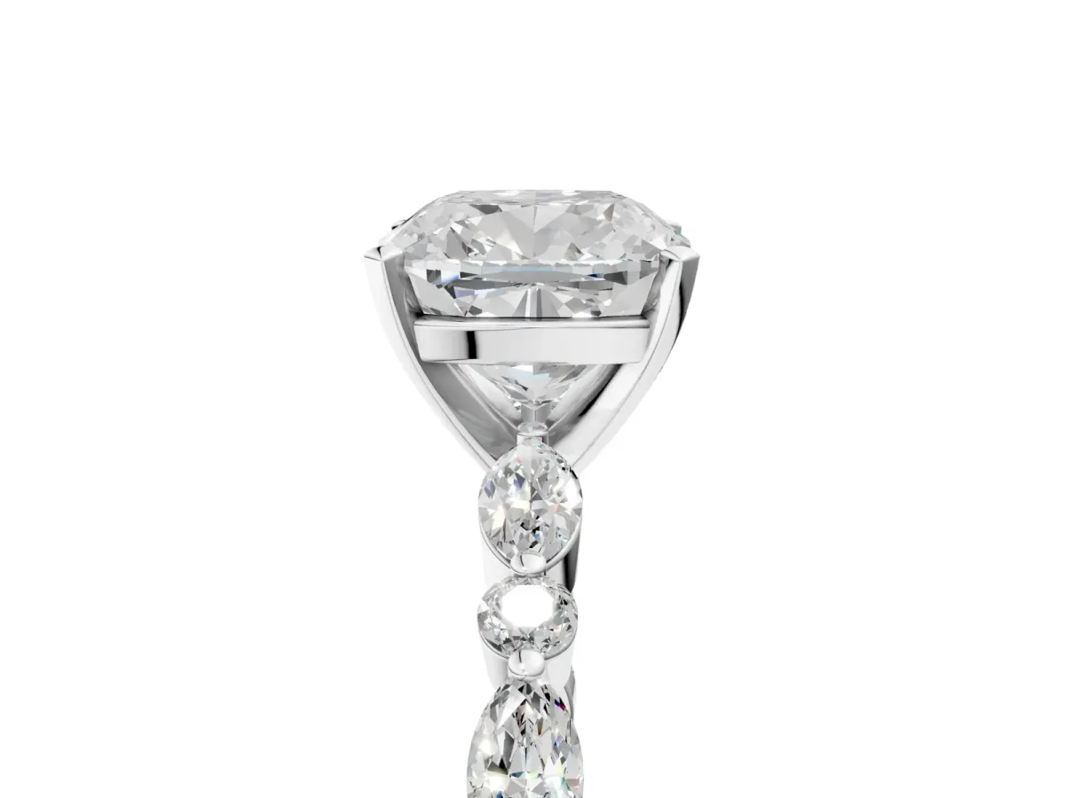 Cushion Cut Diamond Ring with Marquise and Round Side Stones and Four-Prong Setting Silver
