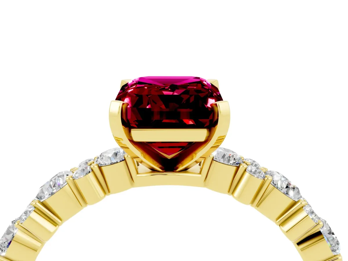 Emerald Cut Garnet Side Stone Solitaire Ring with Round and Four-Prong Setting Yellow gold