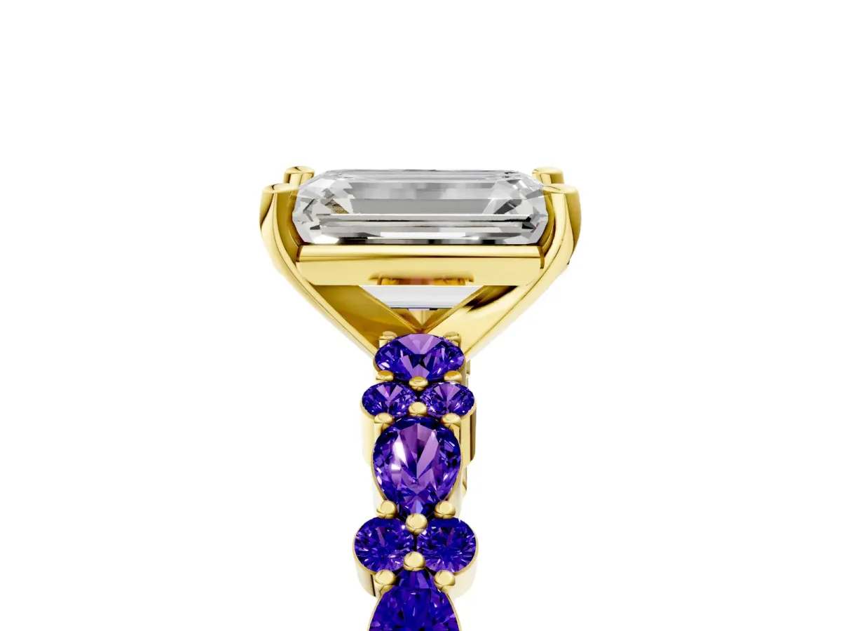 Emerald Cut Diamond Side Stone Solitaire Ring with Round Tanzanite and Four-Prong Setting Yellow gold