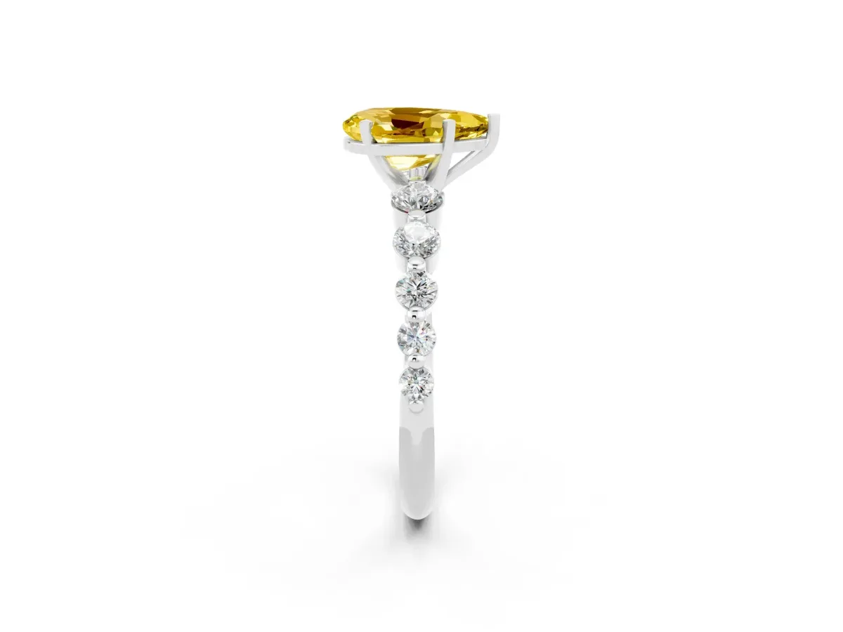 Pear Cut Solitaire Yellow Sapphire Ring with Pave Band and Four-Prong Setting Silver