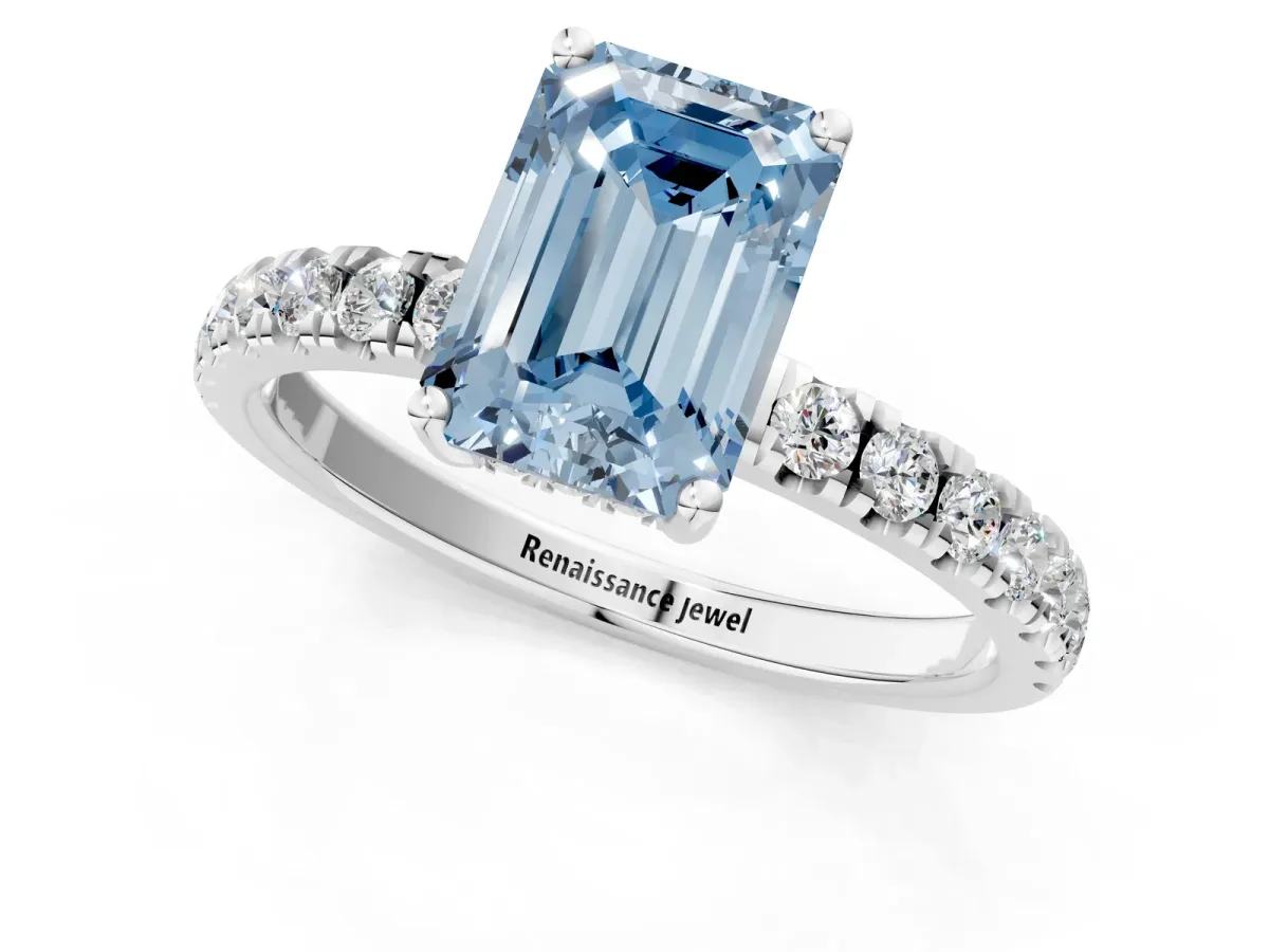 Fancy Blue Emerald Cut Diamond Pave Band Solitaire Ring with Round and Prong Setting Platinum