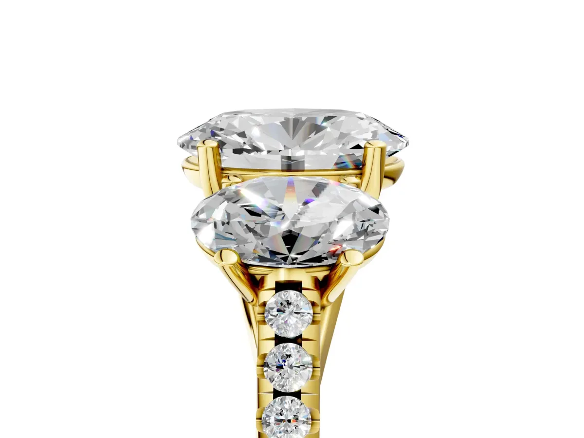 Three-Stone Oval Cut Diamond Ring with Round Pavé Band and Prong Setting Yellow gold