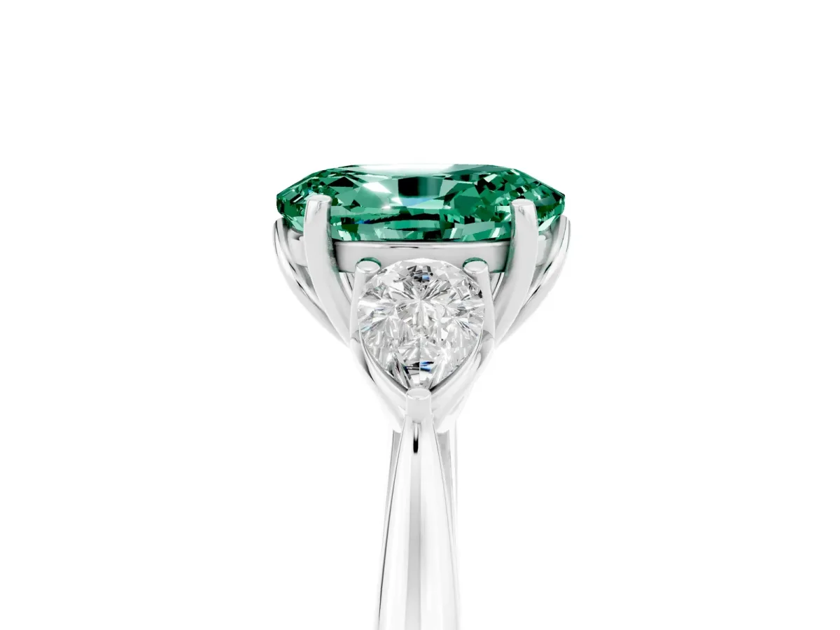 Three-Stone Oval Cut Green Sapphire Ring with Pear Side Stones in Four-Prong Setting White gold