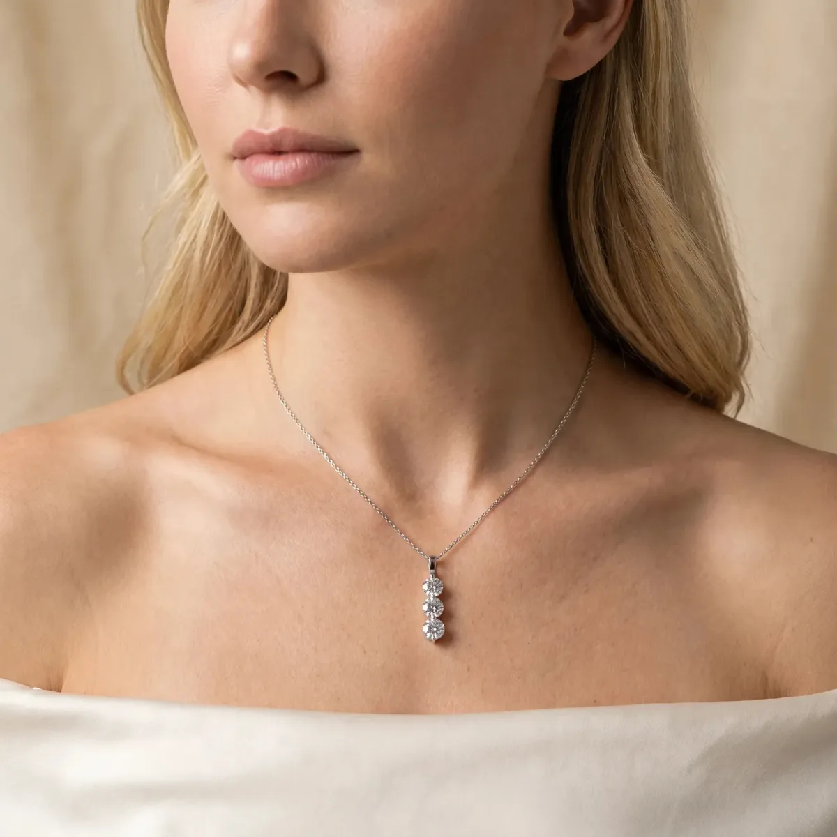 Three-Stone Round Diamond Drop Pendant with Four-Prong Setting White gold