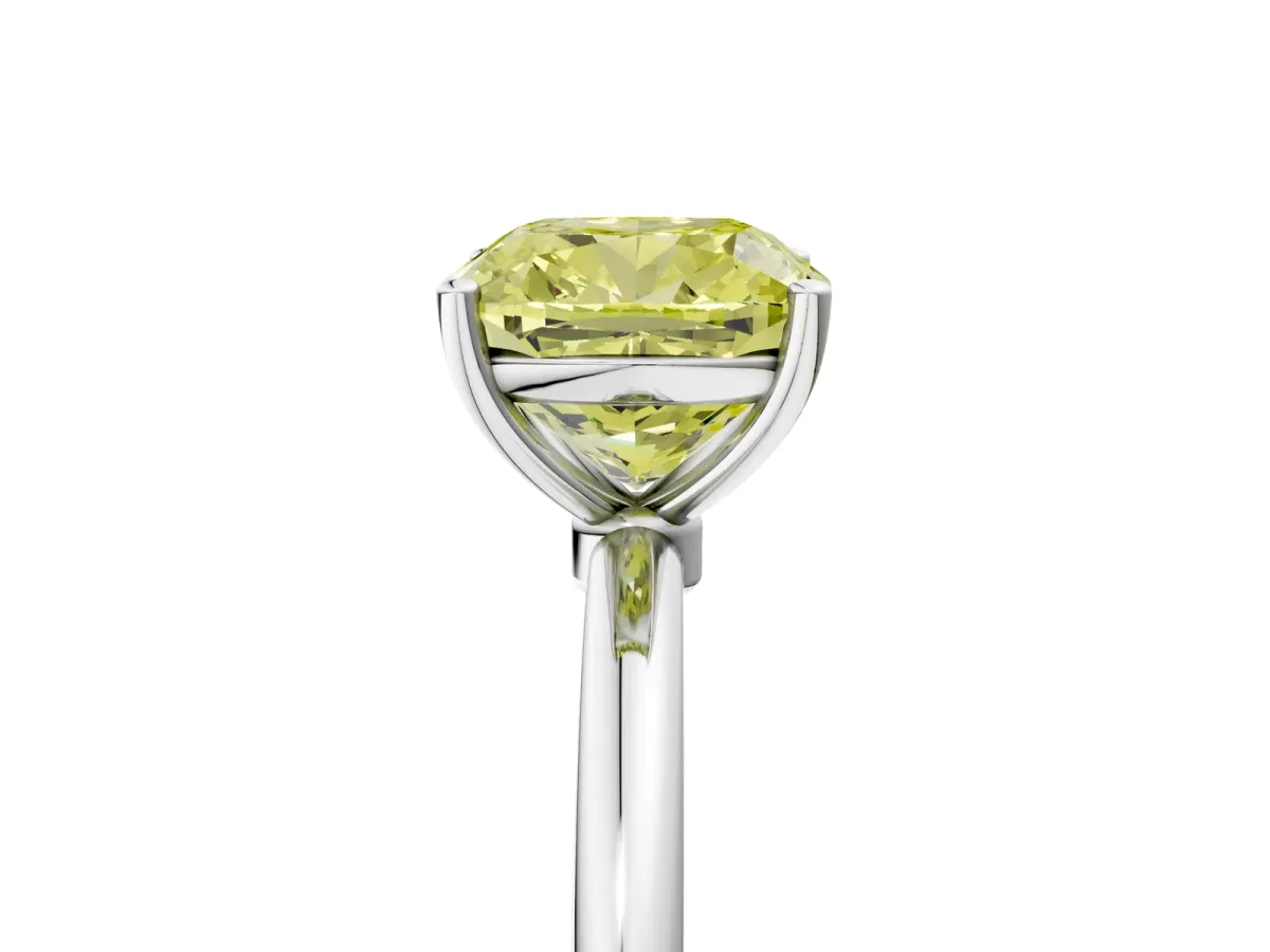 Fancy Yellow Cushion Cut Cut Solitaire Engagement Ring with Thin Band and Four-Prong Setting Silver
