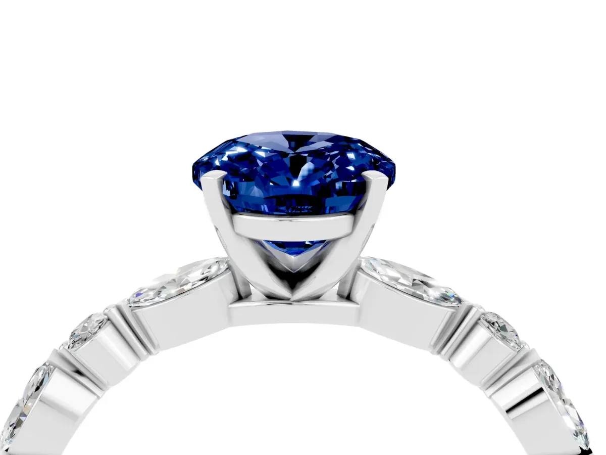 Oval Cut Blue Sapphire Ring with Marquise and Round Side Stones and Four-Prong Setting Silver