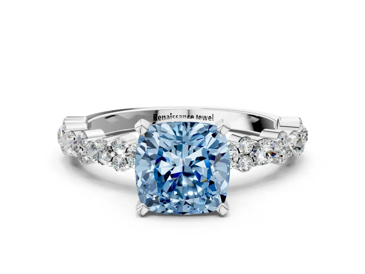 Fancy Blue Cushion Cut Diamond Side Stone Solitaire Ring with Round and Four-Prong Setting White gold