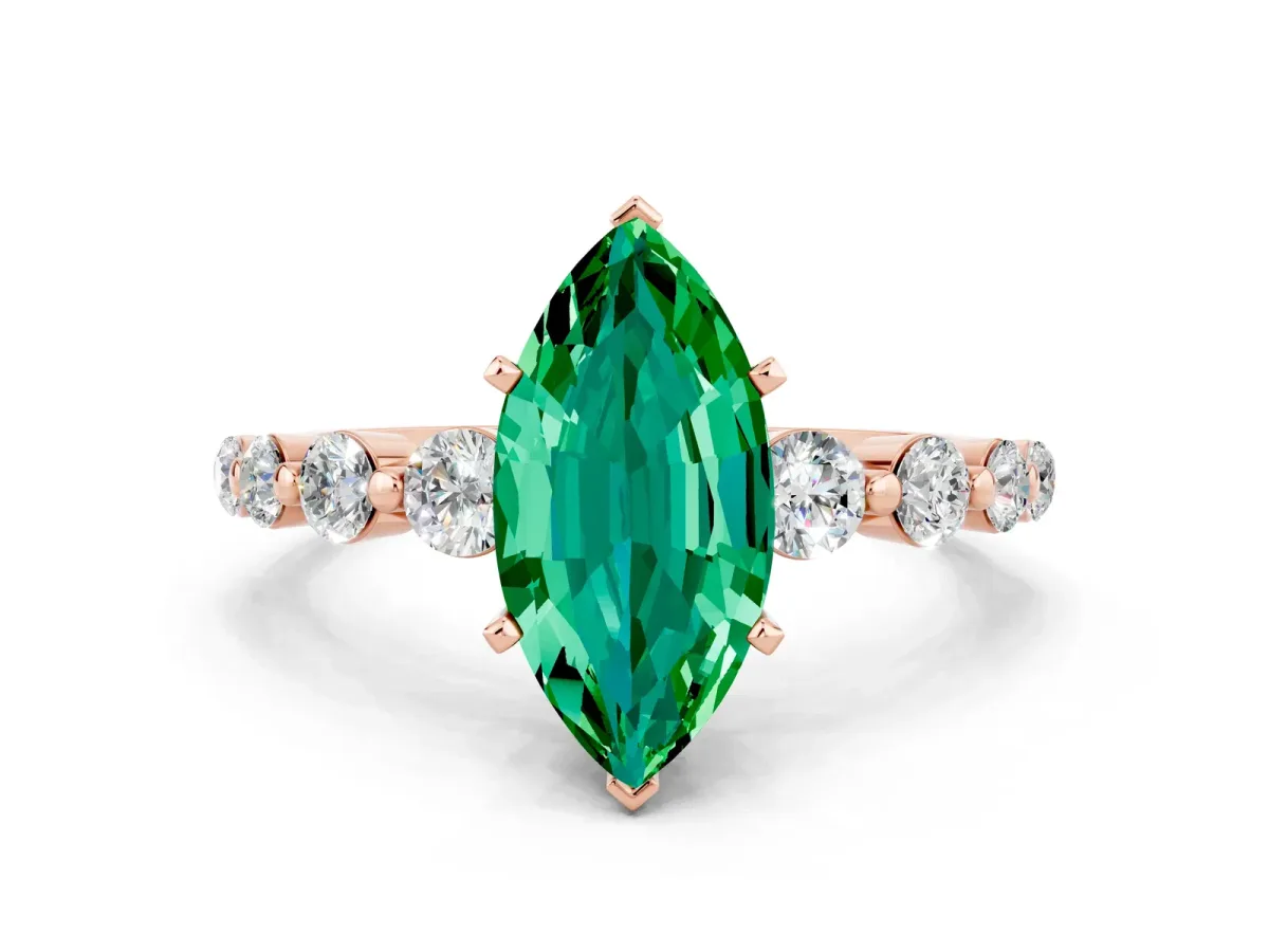 Marquise Cut Solitaire Emerald Ring with Pave Band and Four-Prong Setting Rose gold