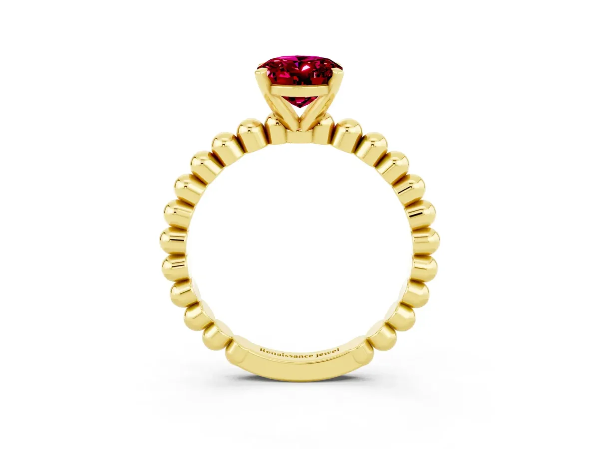 Oval Cut Garnet Solitaire Ring with Beaded Band and Prong Setting Yellow gold