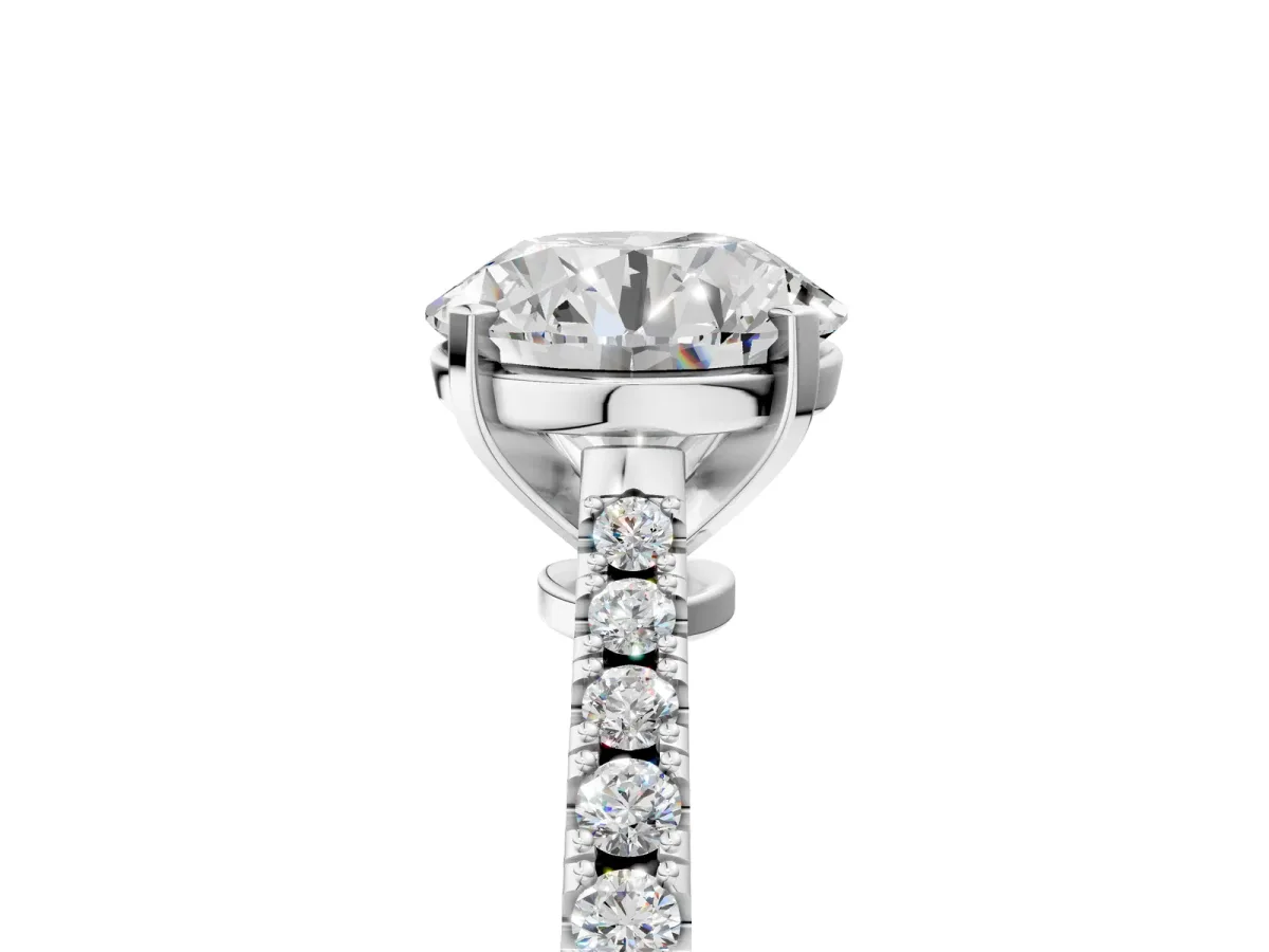 Round Cut Cut Solitaire Diamond Engagement Ring with Pave Band and Four-Prong Setting Silver
