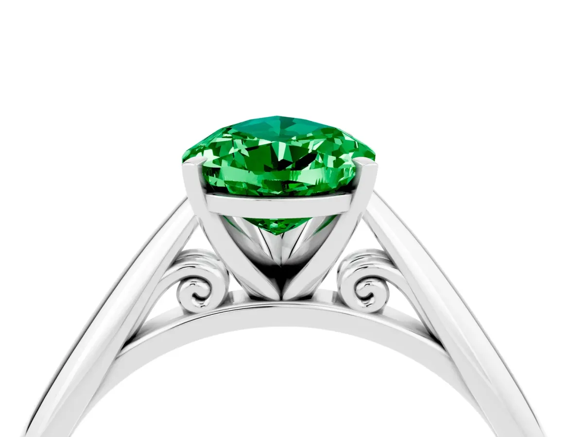Pear Cut Emerald Solitaire Engagement Ring with Cathedral Setting and Four-Prong Mount White gold