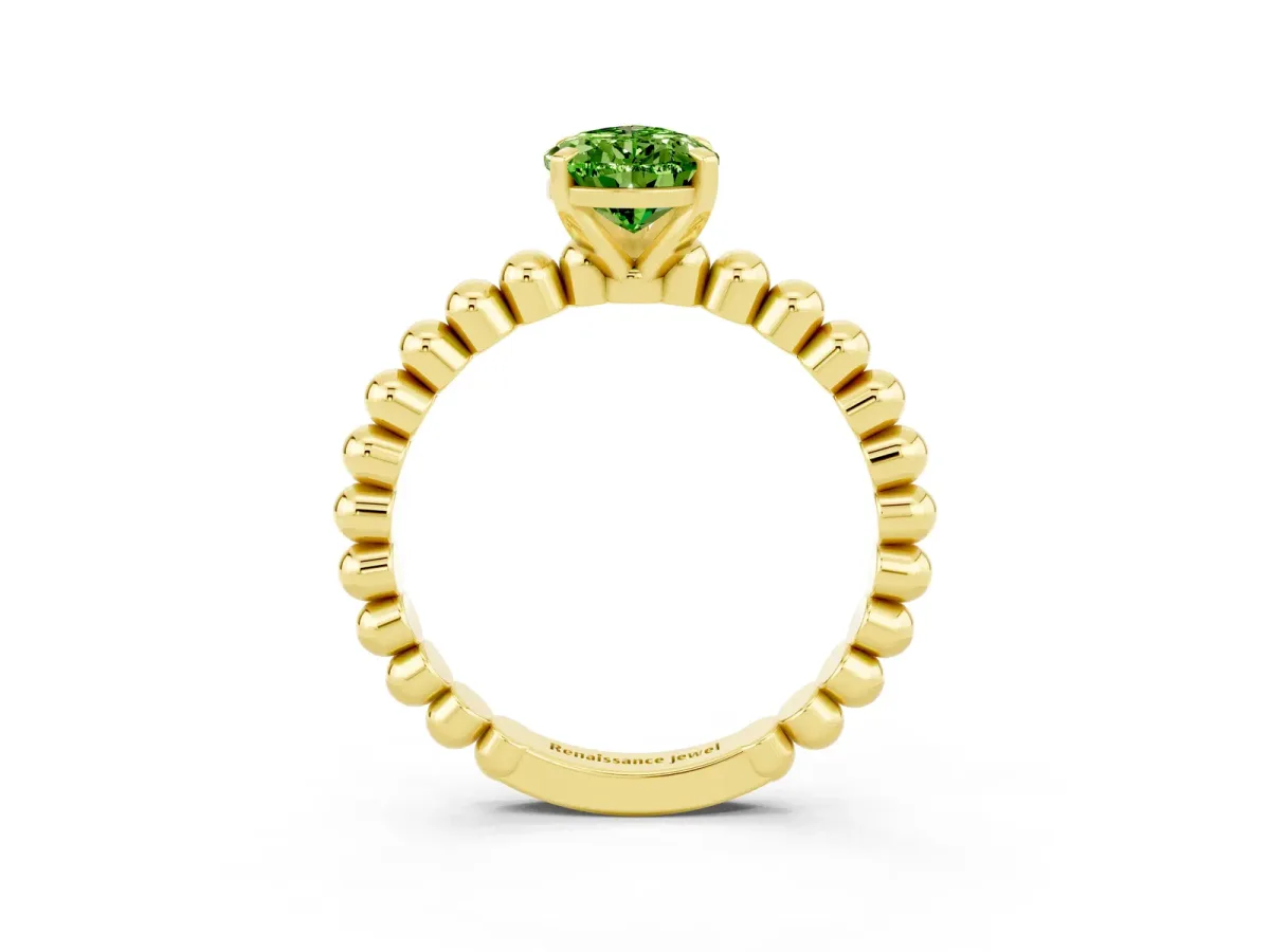 Pear Cut Peridot Solitaire Ring with Beaded Band and Prong Setting Yellow gold