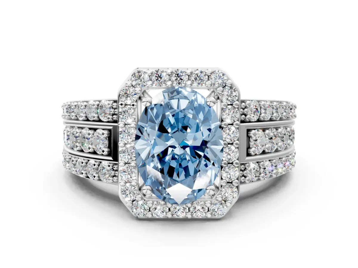 Fancy Blue Oval Cut Halo Diamond Ring with Round Split Shank and Prong Setting Platinum