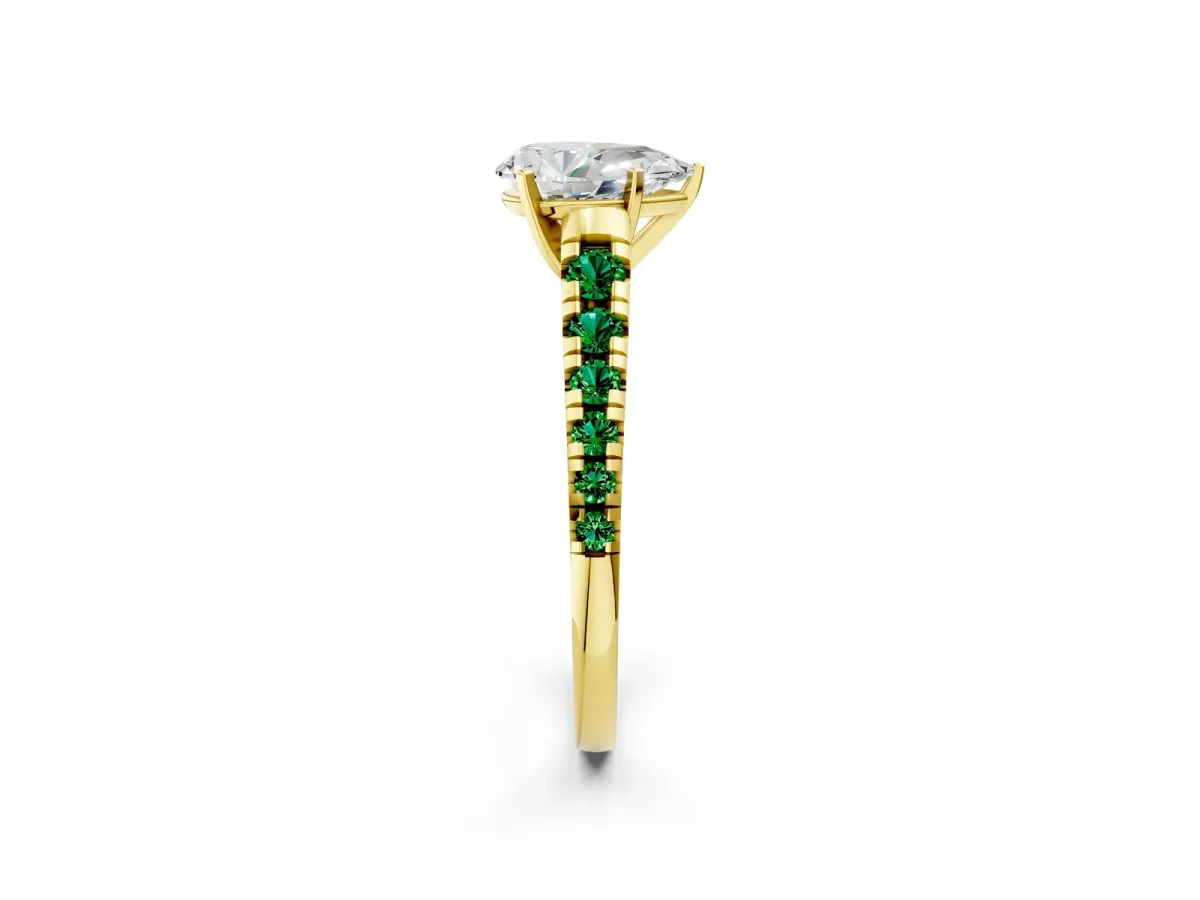 Pear Cut Diamond Cathedral Solitaire Ring with Round Emerald Pavé Band Yellow gold