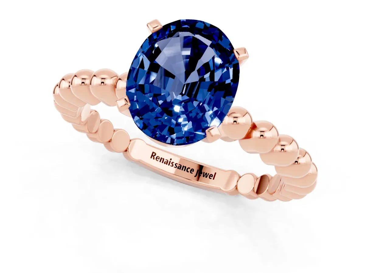 Oval Cut Blue Sapphire Solitaire Ring with Beaded Band and Prong Setting Rose gold