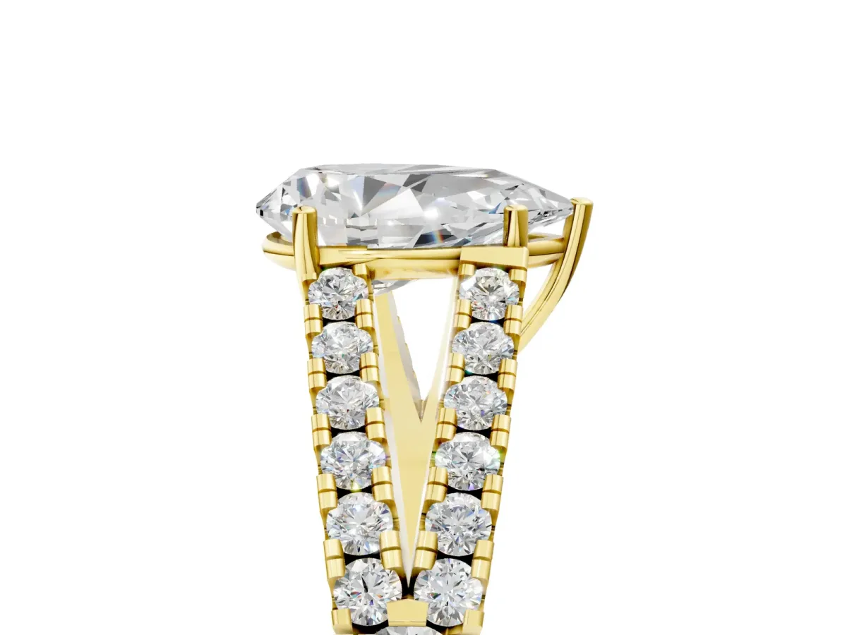 Pear Cut Diamond Split Shank Pavé Engagement Ring with Four-Prong Setting Yellow gold