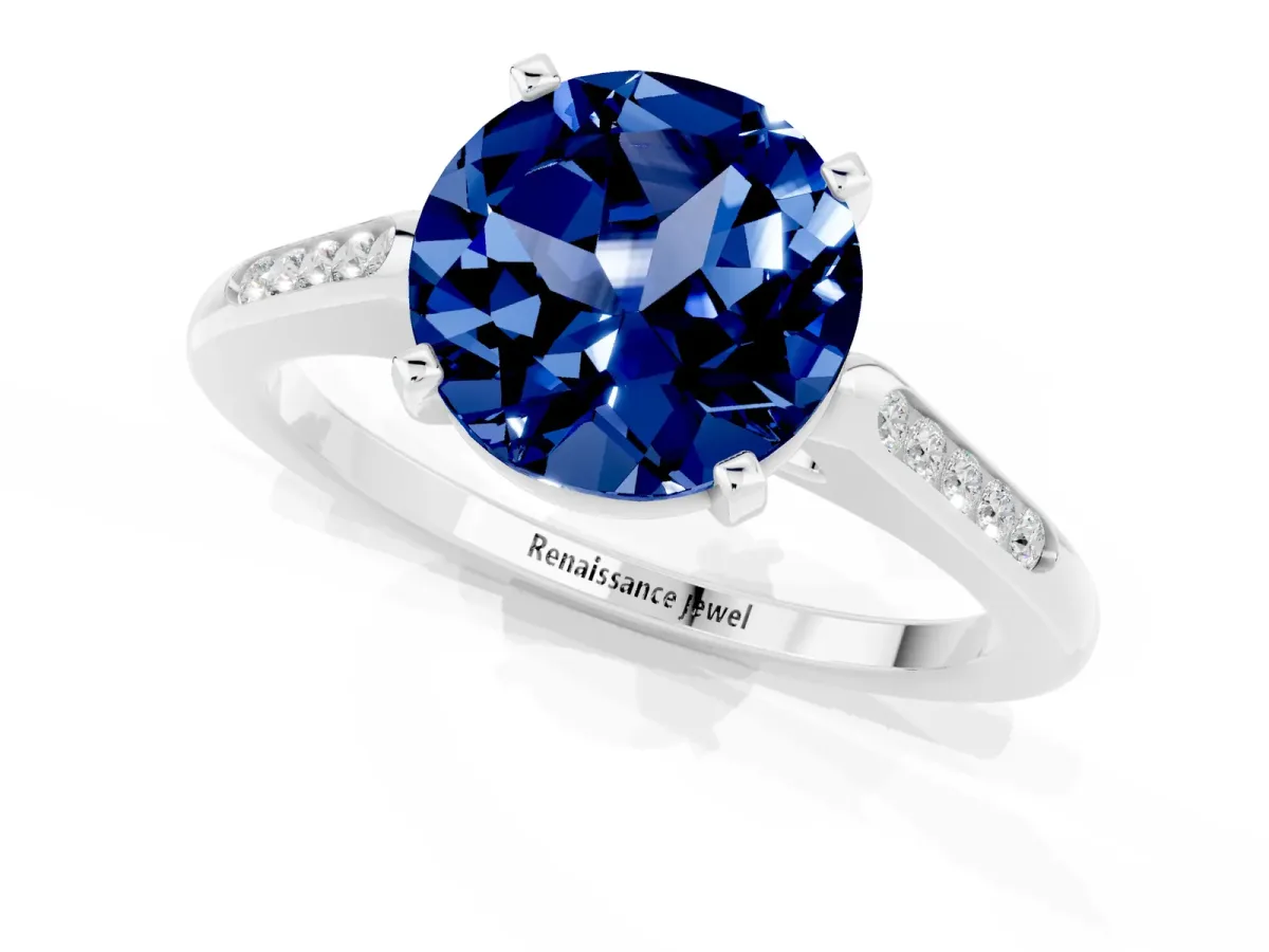 Round Cut Blue Sapphire Solitaire Ring with Channel Set Round Band and Prong Setting Silver