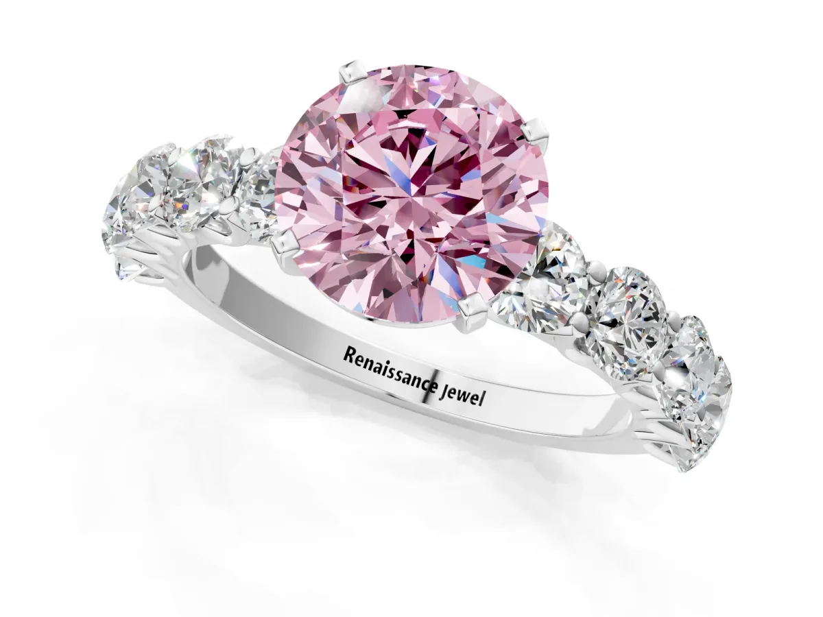 Fancy Pink Round Cut Diamond Prong Setting with Side Stones on a Pave Band White gold