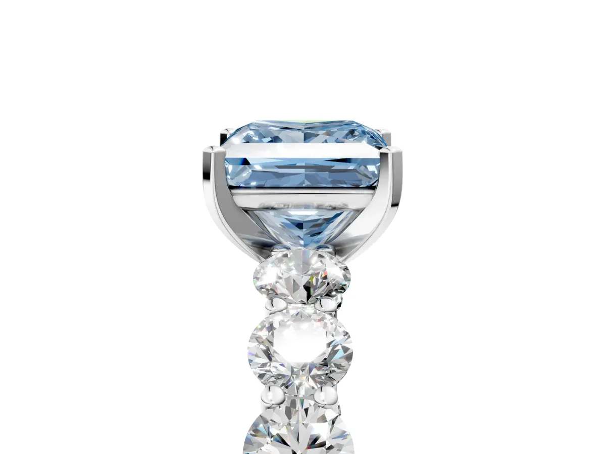 Fancy Blue Princess Cut Diamond Prong Setting with Side Stones on a Pave Band Silver