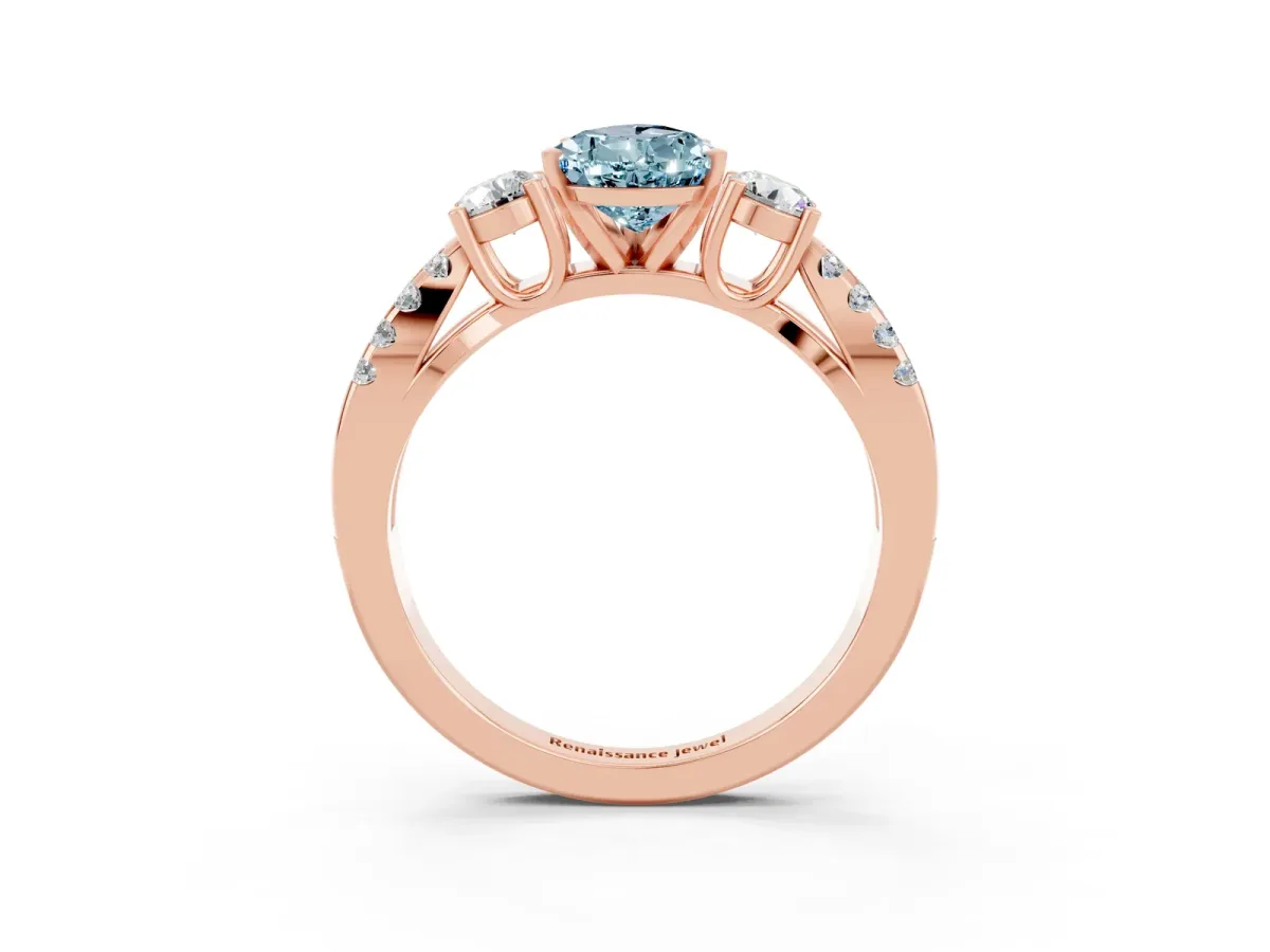 Pear Cut Aquamarine Three-Stone Ring with Pavé Split Shank and Four-Prong Setting Rose gold