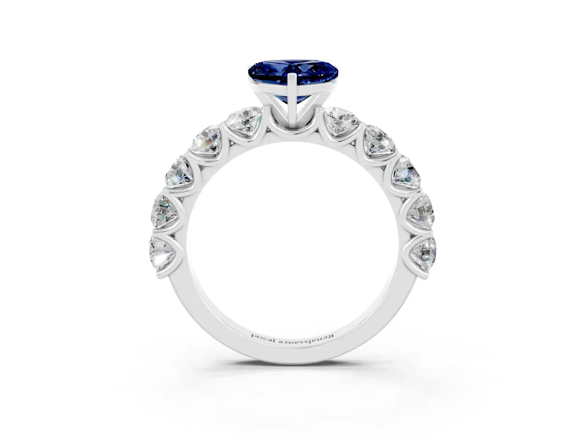 Heart Cut Blue Sapphire Prong Setting with Side Stones on a Pave Band Silver