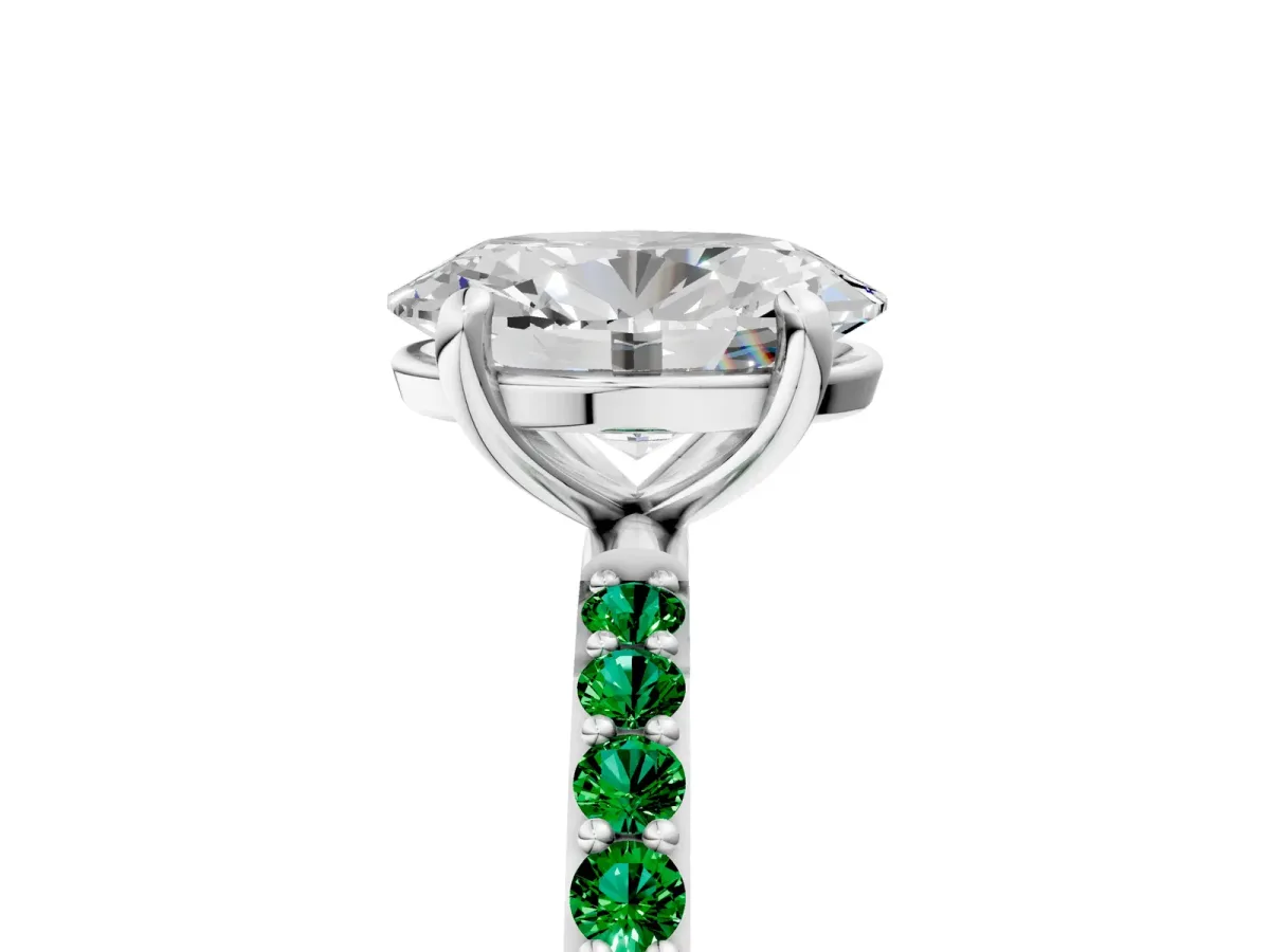 Oval Cut Diamond Solitaire Ring with Round Emerald Pavé Band and Prong Setting Silver