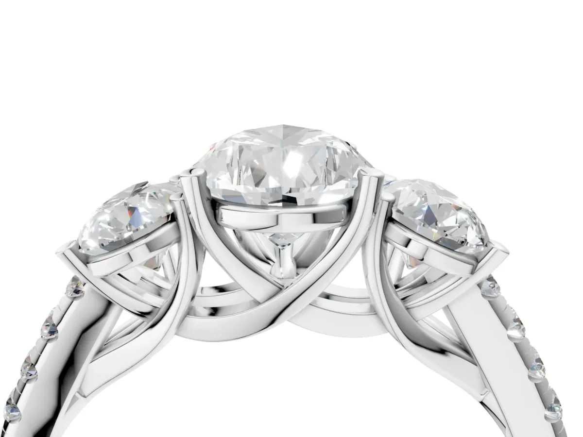 Three-Stone Pear Cut Diamond Ring with Round Pavé Band and Prong Setting Platinum