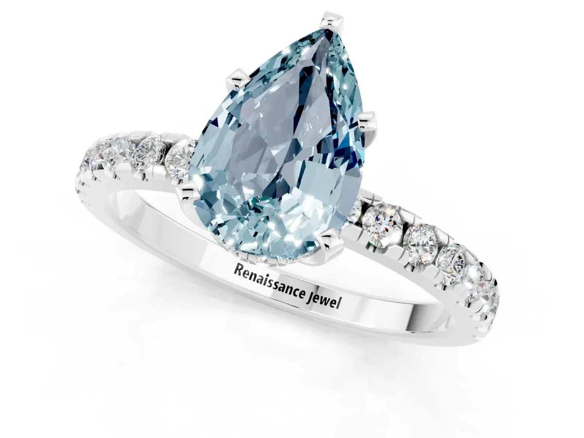 Pear Cut Aquamarine Solitaire Ring with Round Pavé Band and Four-Prong Setting Silver