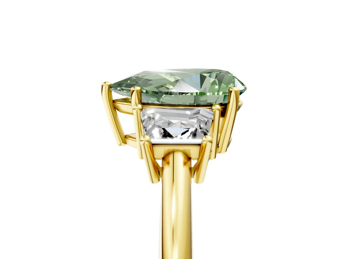 Fancy Green Pear Cut Diamond Three-Stone Ring with Trapezoid Side Stones and Prong Setting Yellow gold