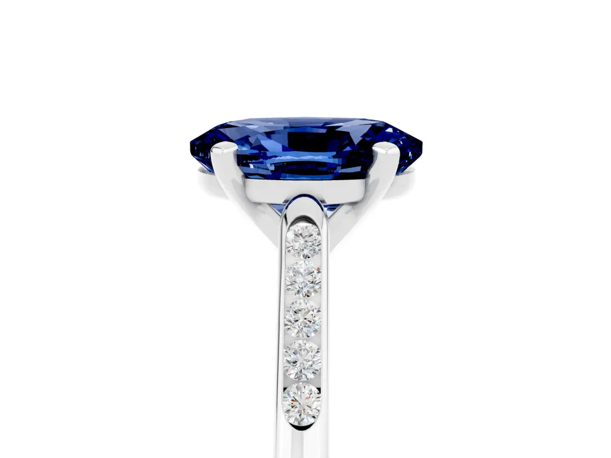 Oval Cut Blue Sapphire Solitaire Ring with Channel Set Round Band and Prong Setting Silver